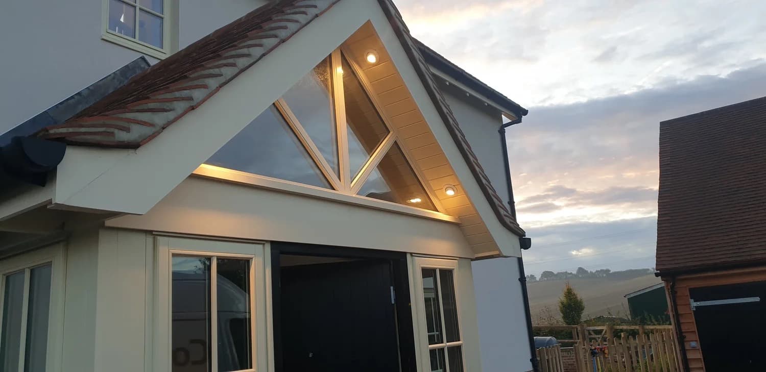 Feature lighting fitted above a front door in Saffron Walden